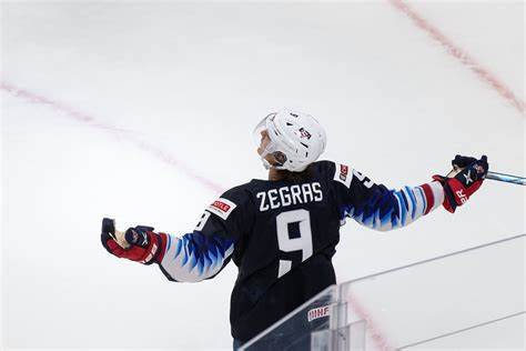 Trevor Zegras celebrates for Team USA