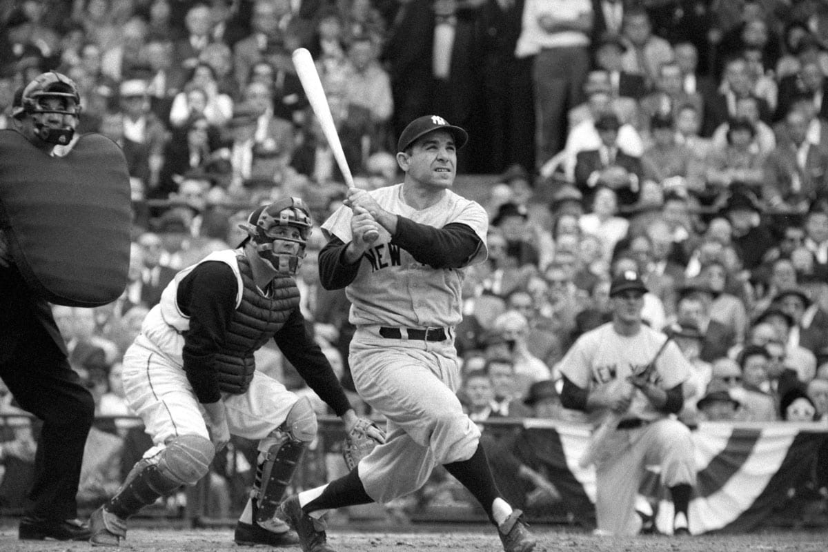 Yogi Berra hits during the World Series for the Yankees